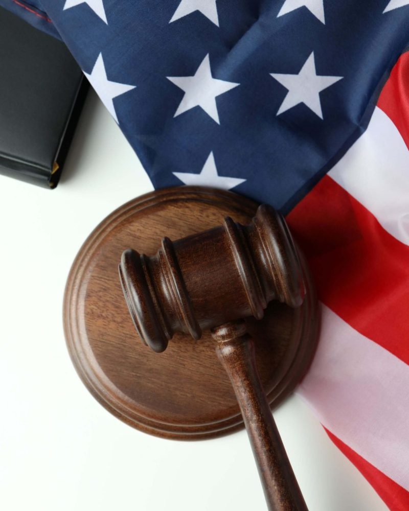 american-law-concept-with-judge-gavel-on-white-bac-2021-09-04-06-51-53-utc (1)